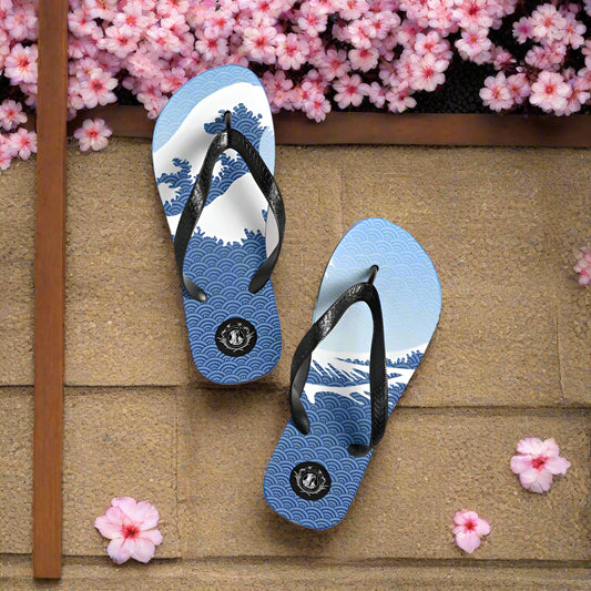Asian print Tsunami Sky flip-flops with blue waves pattern and black straps for stylish summer wear