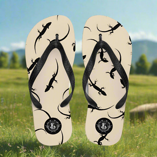 Beige lizard print flip-flops with black straps for stylish summer wear