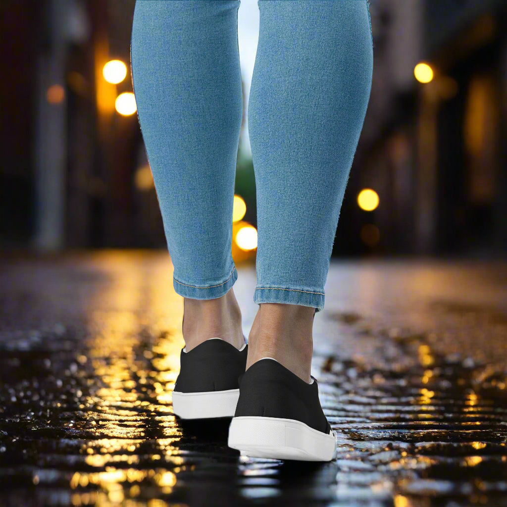 Black Chex Halftone Slip-on Canvas Shoes styled with denim jeans in an urban setting