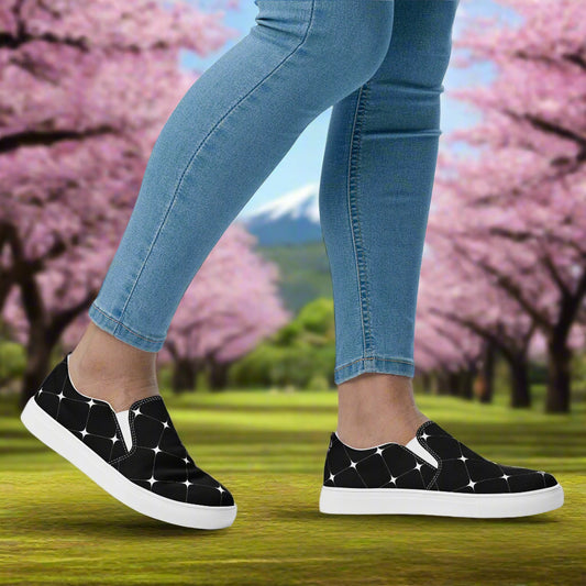 Black Diamond Slip-on Canvas Shoes worn outdoors in a scenic park setting