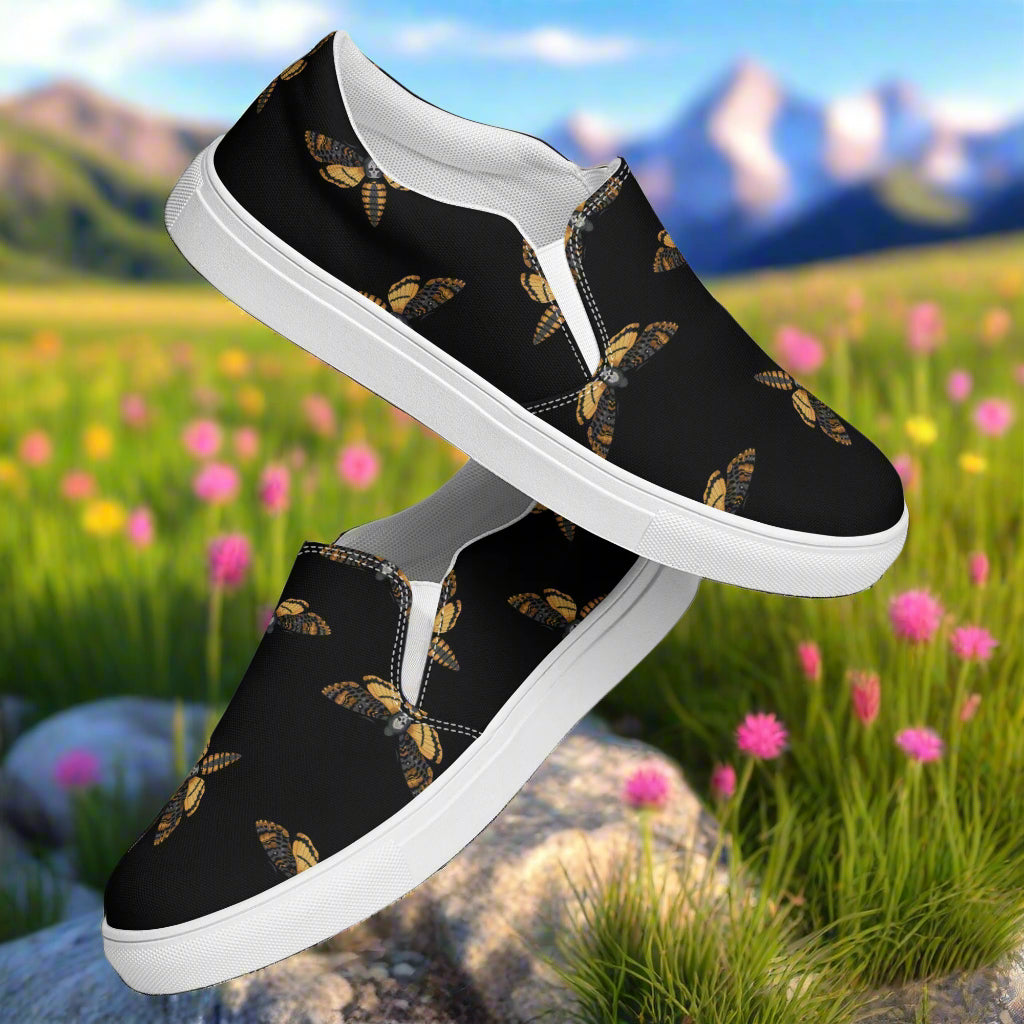Black Moth Slip-on Canvas Shoes featuring a vibrant moth design perfect for casual wear