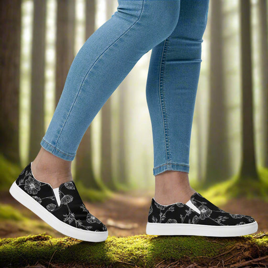 Black Poppy Slip-on Canvas Shoes featuring a stylish floral design, perfect for casual wear