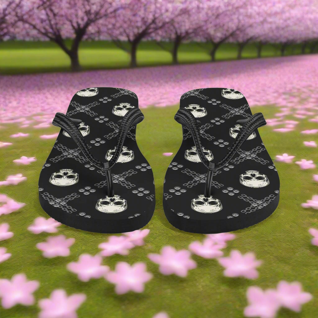 Black skull print rave flip-flops by WildSage Market featuring a unique skull pattern