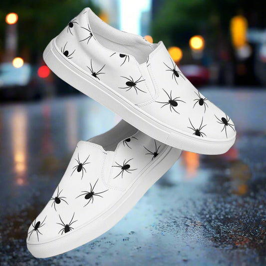 Black Spiders Slip-On Canvas Shoes featuring a unique spider design on a white background