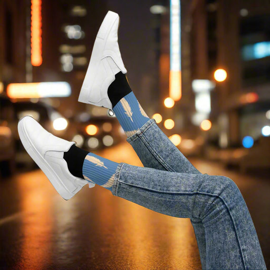 Blue Feather Unisex Socks worn with white sneakers and jeans in an urban setting