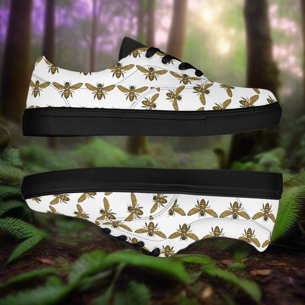 WildSage Market lace up bee pattern canvas shoes with black soles and laces on forest background