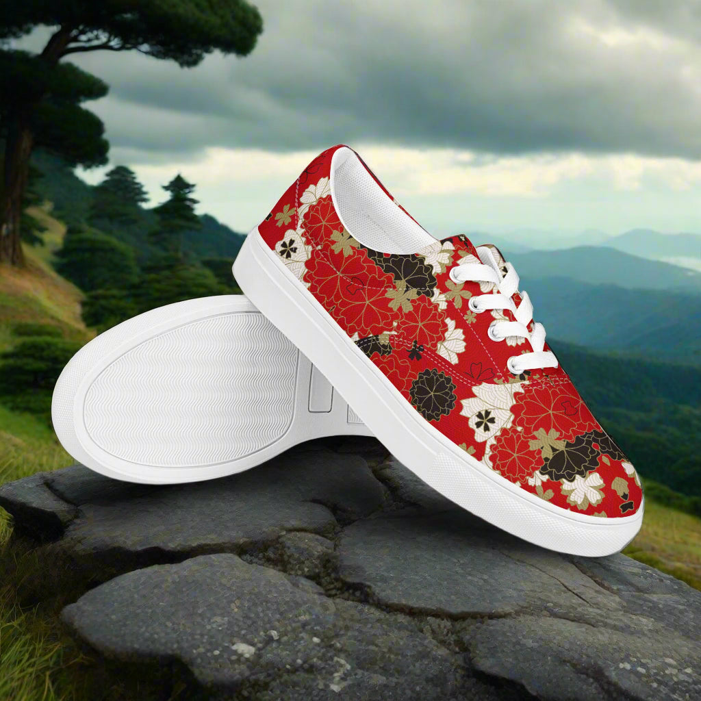 Custom Lace-up Canvas Shoes from WildSage Market red floral pattern low top on rock with mountain view