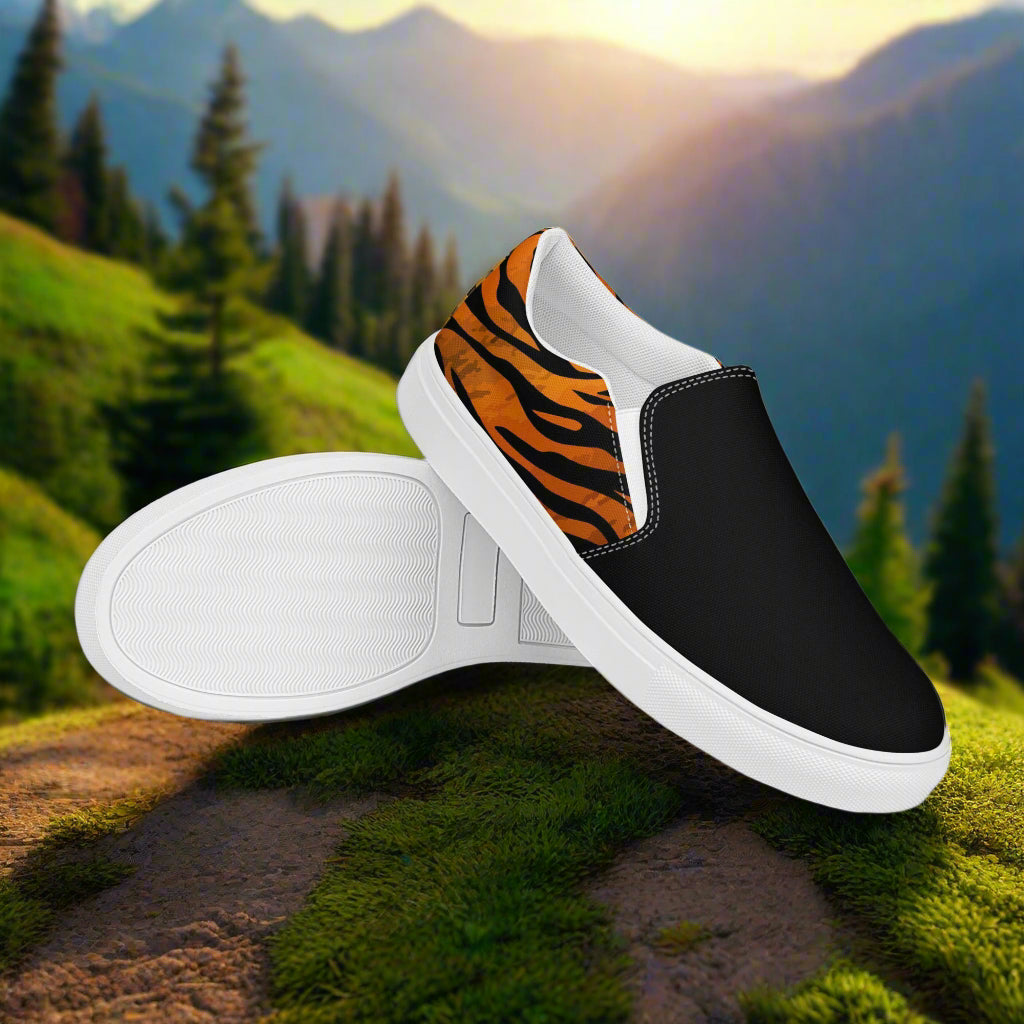 WildSage Market slip on tiger two tone shoes with black front and tiger print sides on outdoor trail