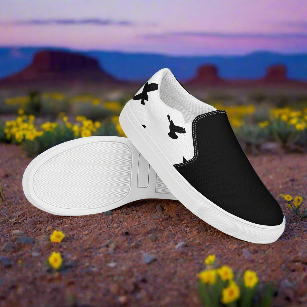 WildSage Market Slip-on Canvas Shoes black and white with bird silhouettes on desert background with yellow wildflowers