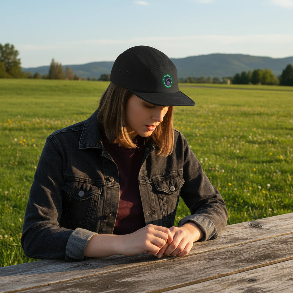 WildSage Market Embroidered Cap Black Raven Logo with a sleek design worn by a model