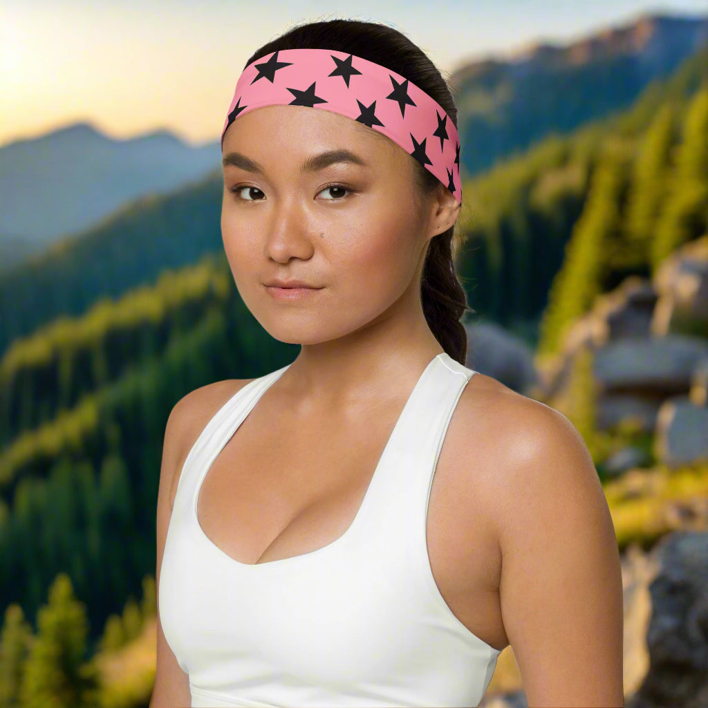 WildSage Market headband pink black stars worn by woman in white tank top outdoors