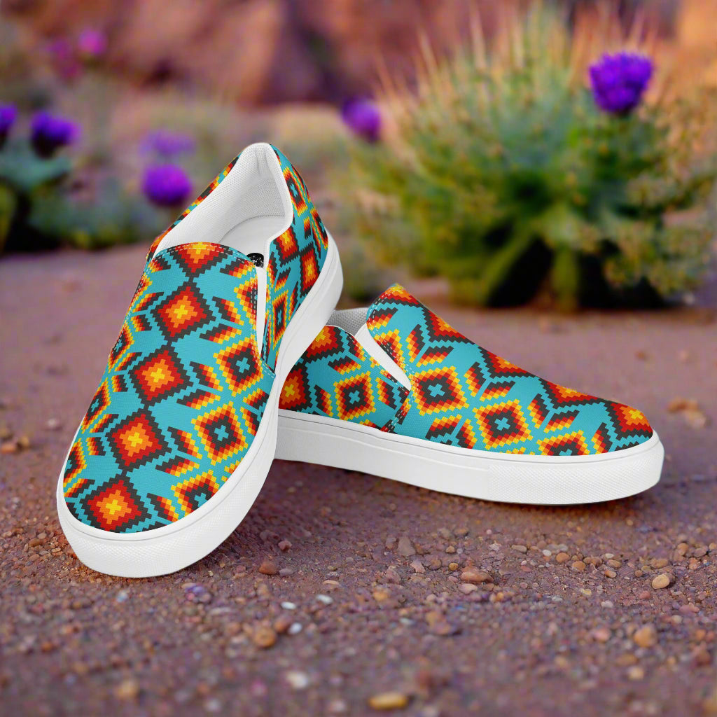 Huichol Southwest Print Slip-on Canvas Shoes featuring vibrant geometric patterns, perfect for casual wear