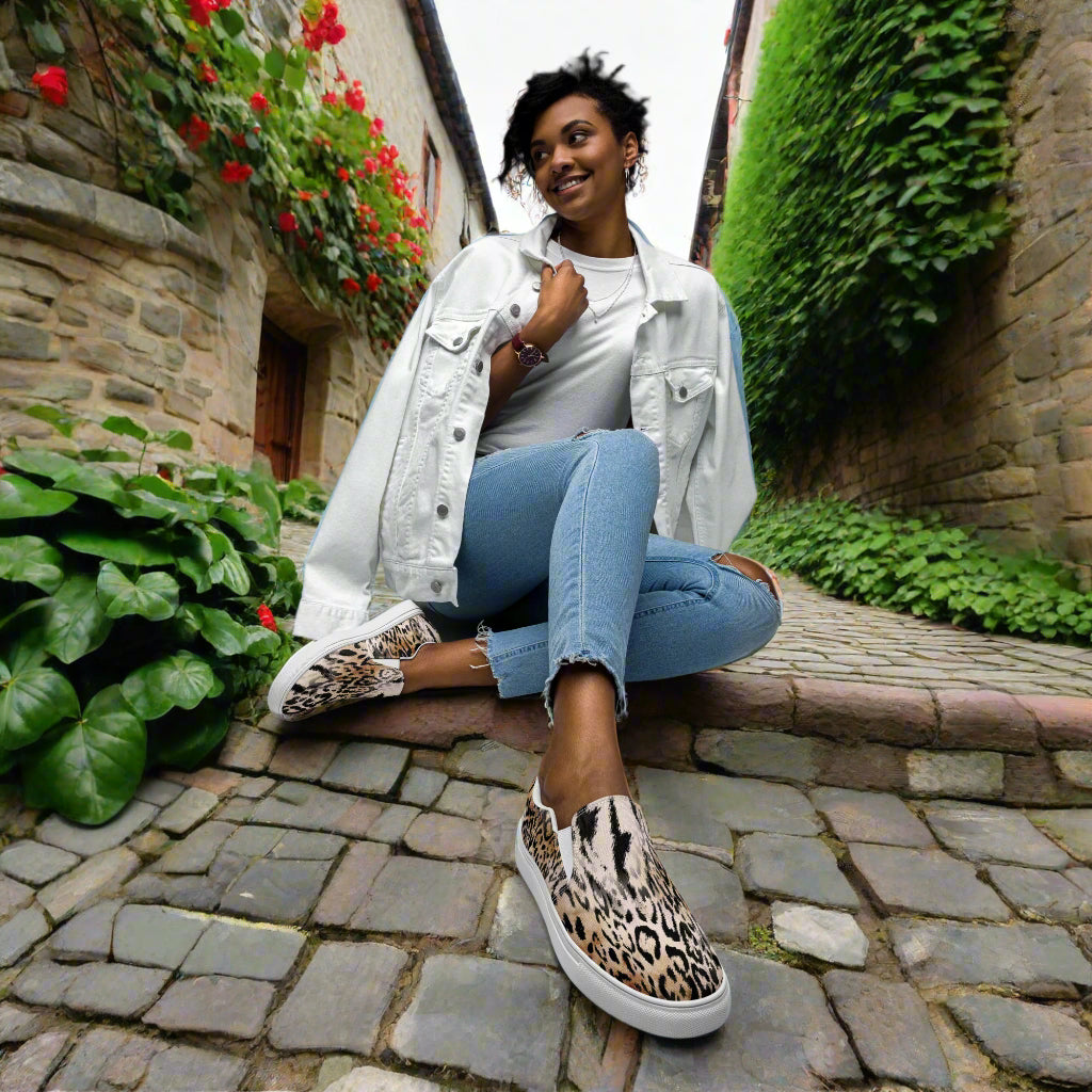 Leopard Print Slip-on Canvas Shoes worn with casual jeans and a denim jacket in a scenic outdoor setting