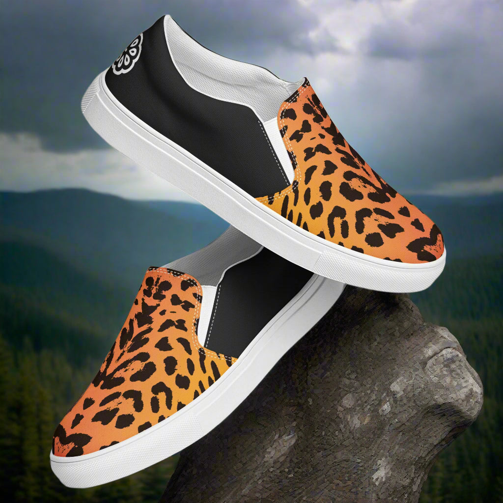 WildSage Market Mens Cheetah Halftone Slip on Canvas Shoes with black and orange leopard print design