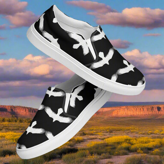 WildSage Market mens white raven print slip on shoes with black background and white bird design