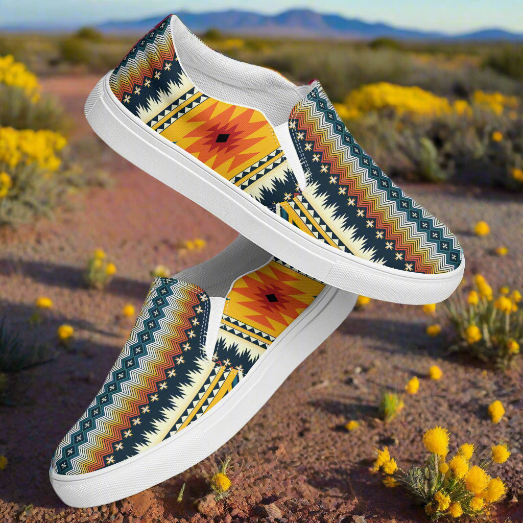Nakai Southwest Print Slip-on Canvas Shoes featuring vibrant geometric patterns against a scenic desert backdrop