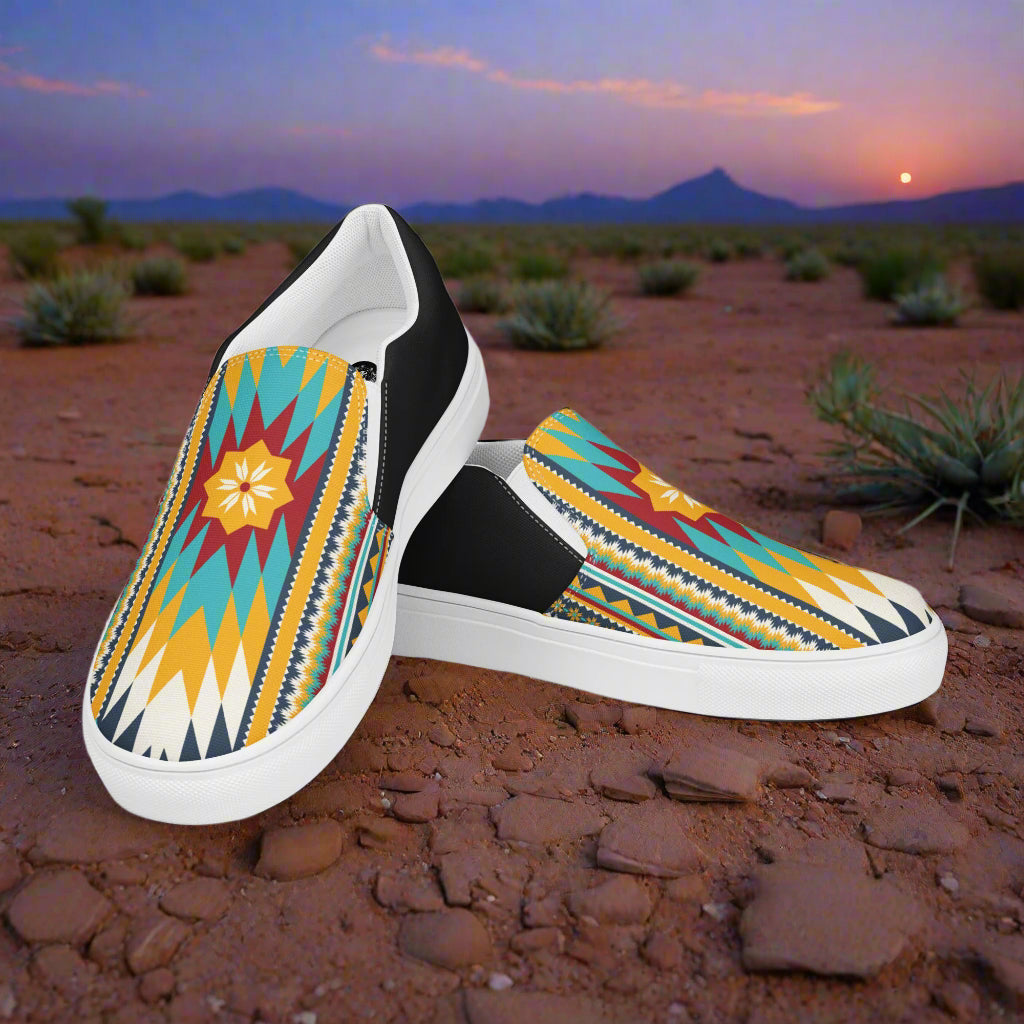 Colorful Slip-on Canvas Shoes Nakona Halftone with Tribal Pattern on a Desert Background