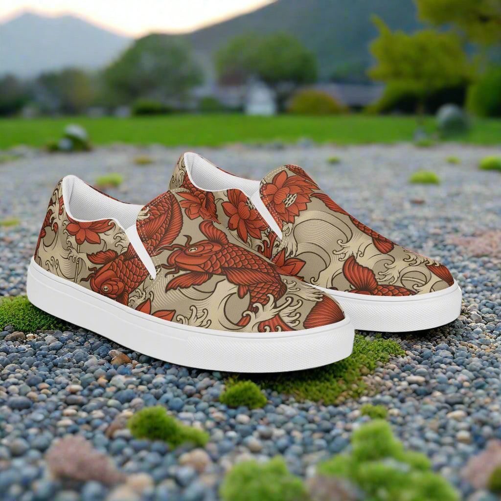 Orange Koi Slip-on Canvas Shoes with a unique koi fish design on a beige background