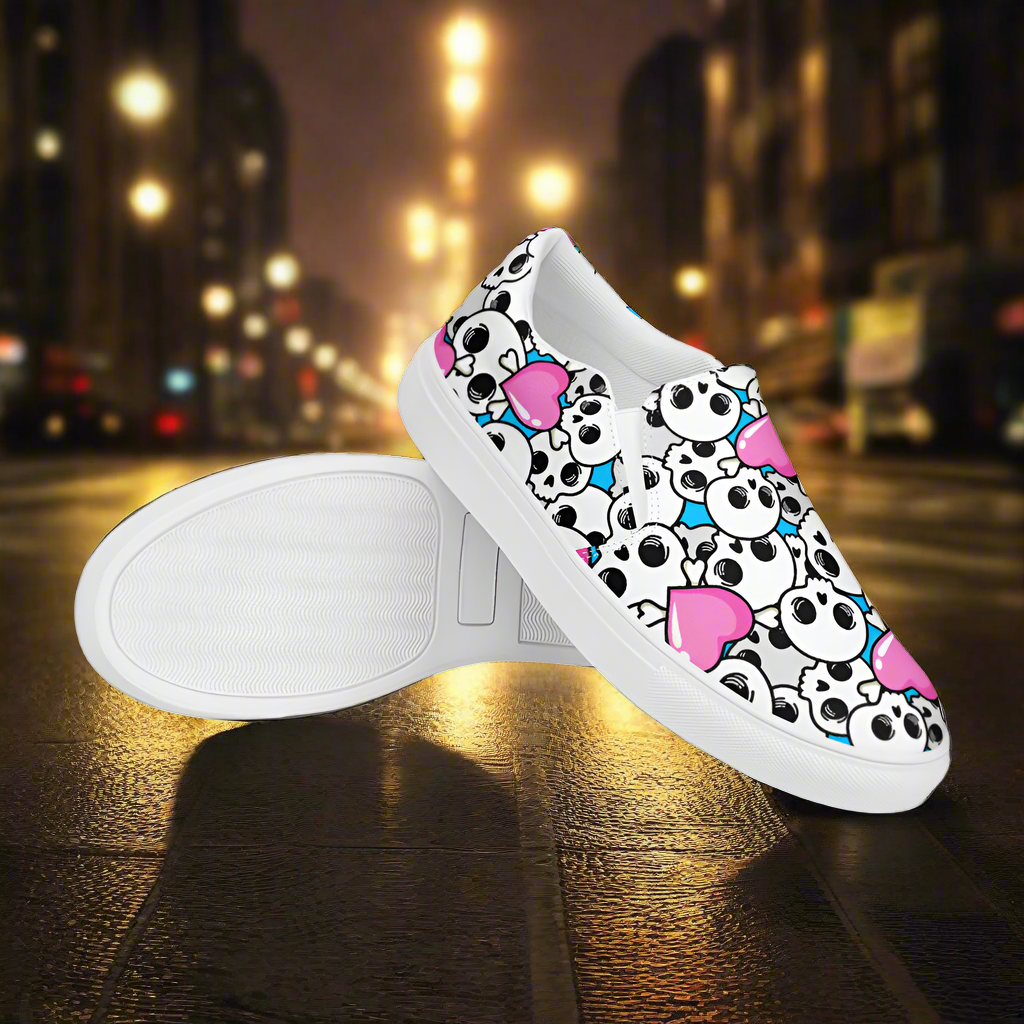 Pink Heart Skulls Slip-On Canvas Shoes featuring a cartoon skull design on a vibrant background
