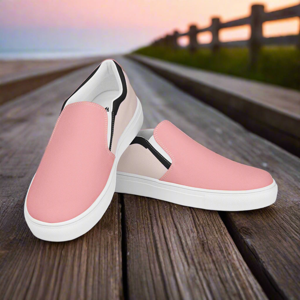 Pink Two Tone Slip-On Canvas Shoes by WildSage Market on a wooden boardwalk