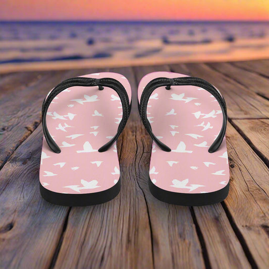 Pink white bird print flip-flops with a comfortable sole for casual summer wear