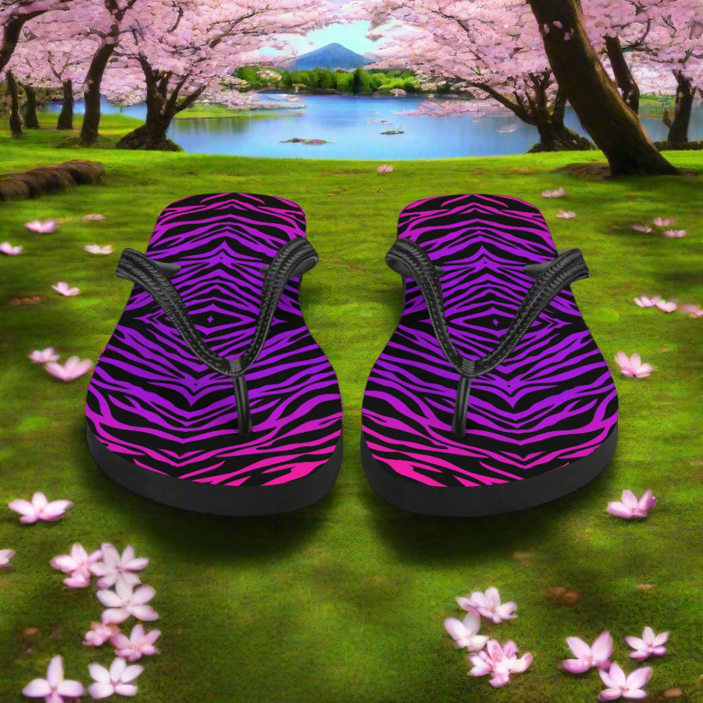WildSage Market purple zebra print flip-flops featuring vibrant colors and a comfortable design