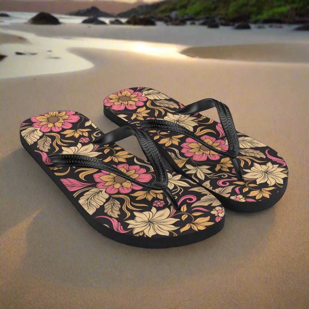 Retro floral pattern flip-flops from WildSage Market featuring vibrant floral designs on a black base