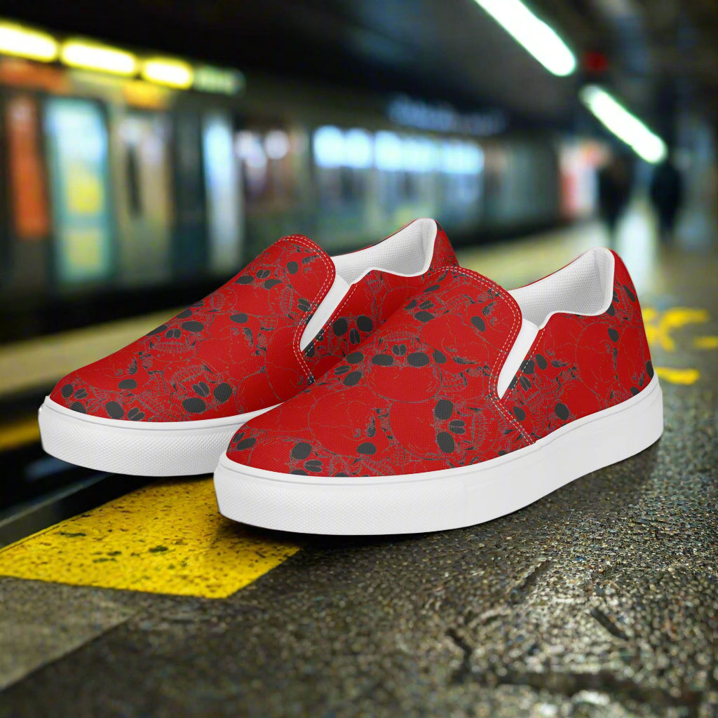 WildSage Skull Pile Crimson Slip-On Canvas Shoes with a bold red design featuring skull patterns