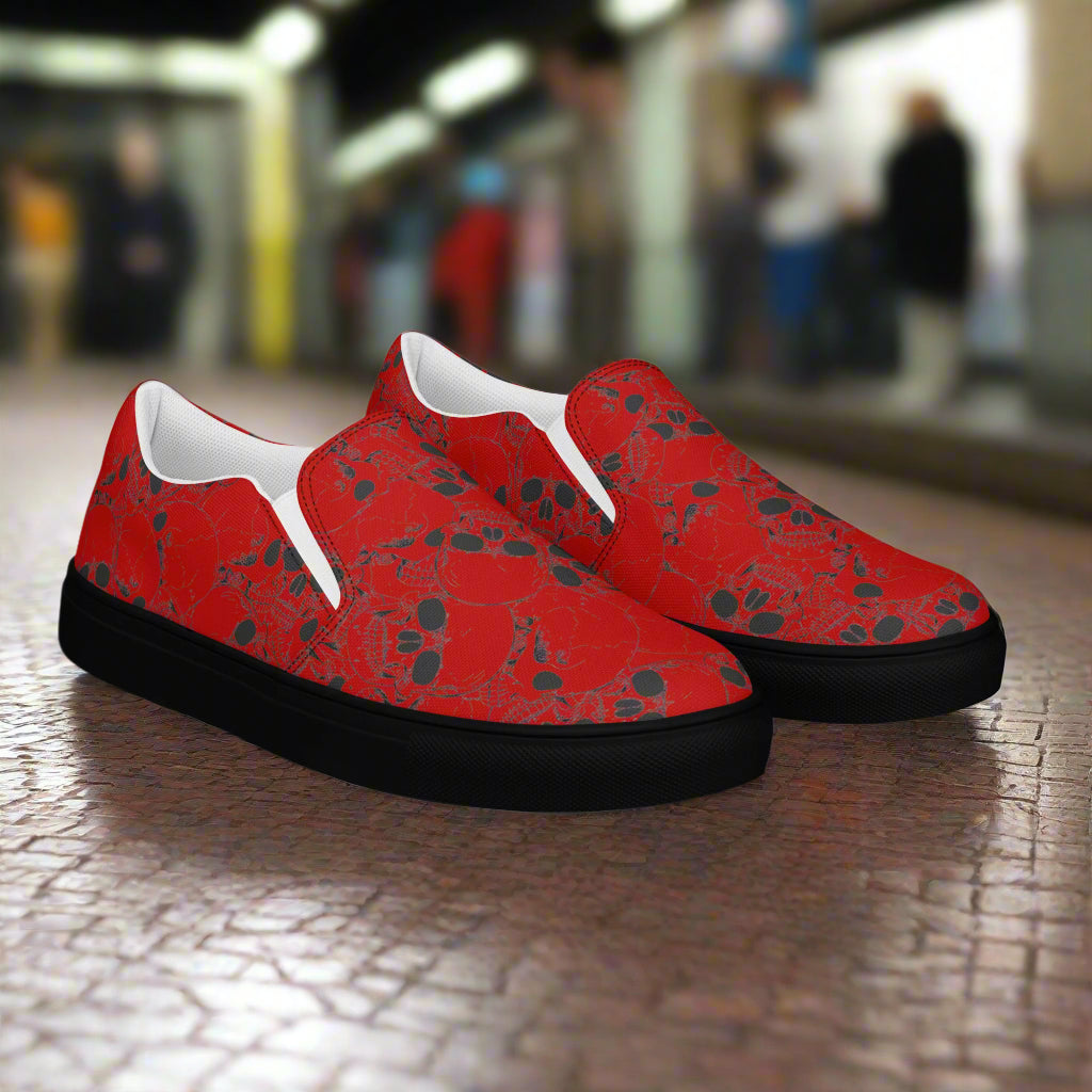 WildSage Skull Pile Crimson Slip-On Canvas Shoes with a vibrant red skull print design