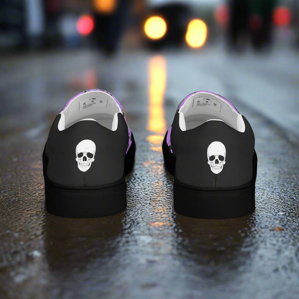 Skull Pile Purple Halftone Slip-On Canvas Shoes from WildSage with a unique skull design on black background