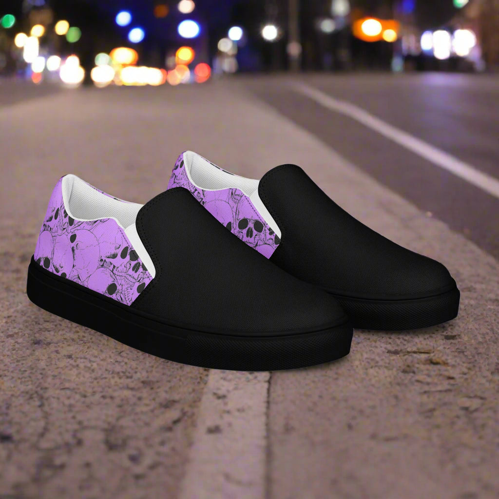Skull Pile Purple Two Tone Slip-On Canvas Shoes by WildSage with a stylish black and purple design