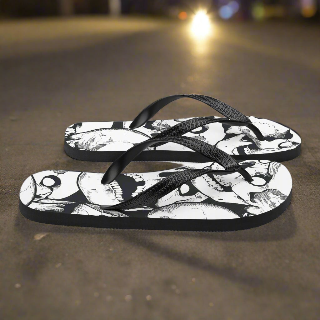 WildSage Market skull print flip-flops featuring a black and white design for casual summer wear