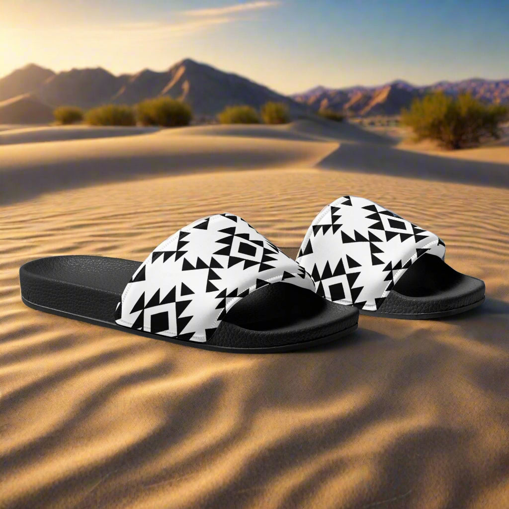 WildSage Market slides with Southwest pattern in black and white on desert sand background
