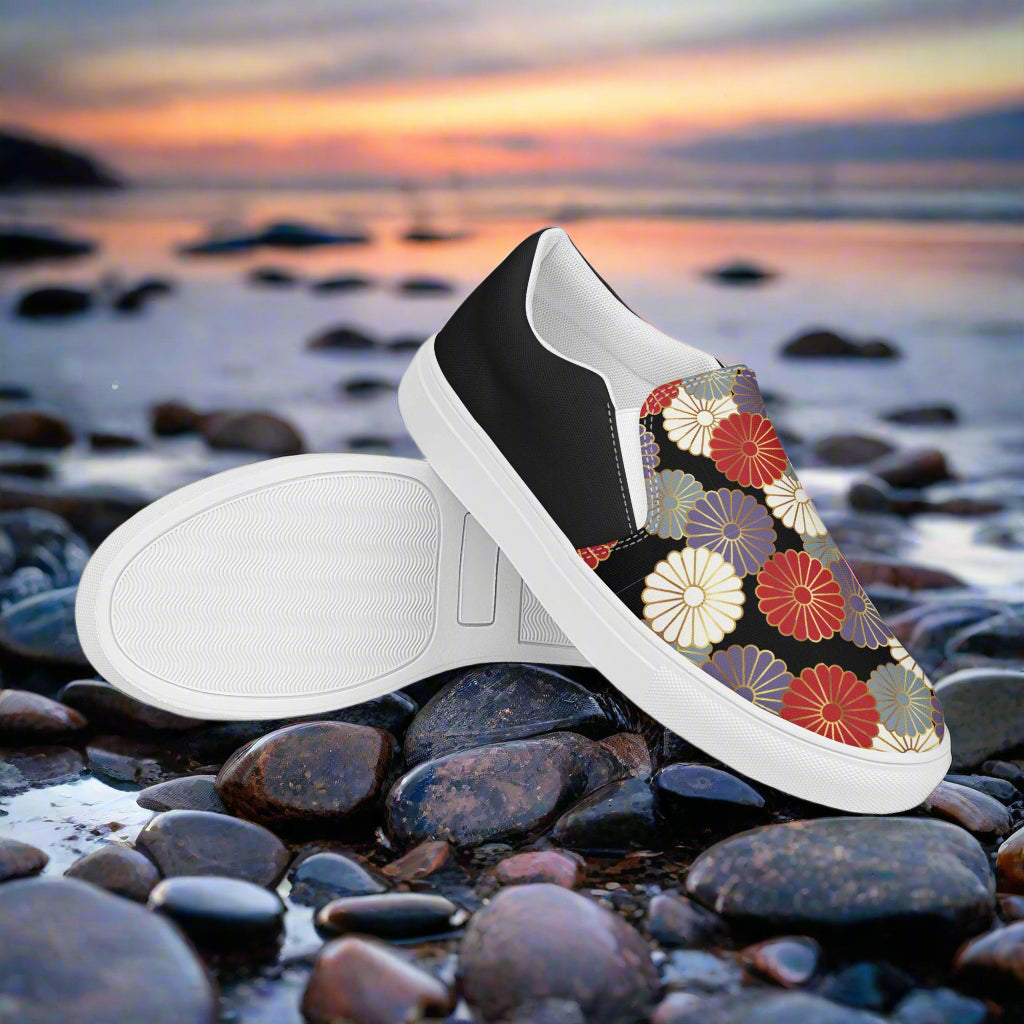 Slip-on Canvas Shoes Chrysanthemum Halftone featuring a colorful floral design against a black background