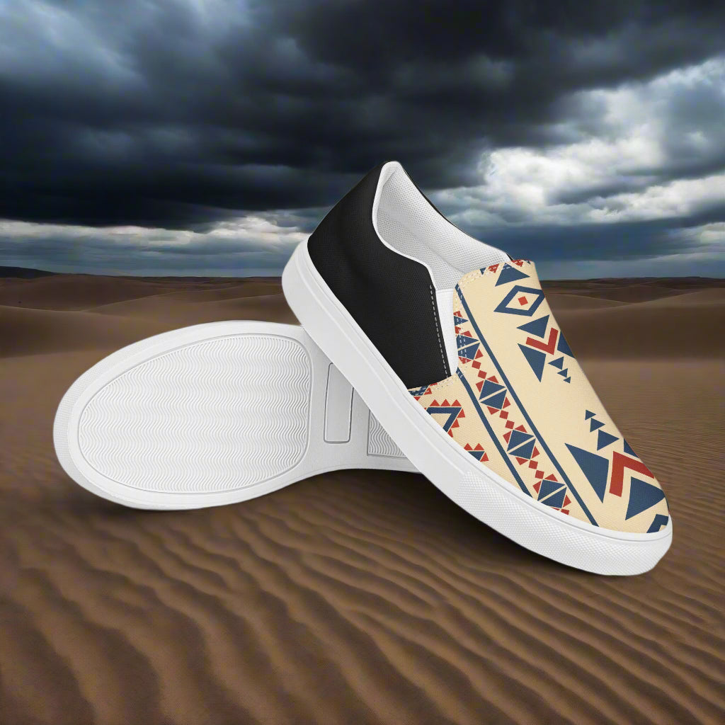 Slip-on Canvas Shoes Desert Sol Halftone with tribal patterns and black accents on sandy background
