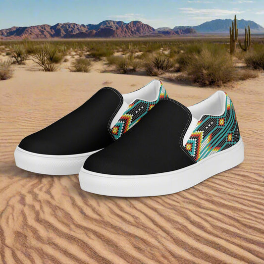 Slip-on Canvas Shoes Hotai Two Tone with colorful tribal design on a black background in a desert setting