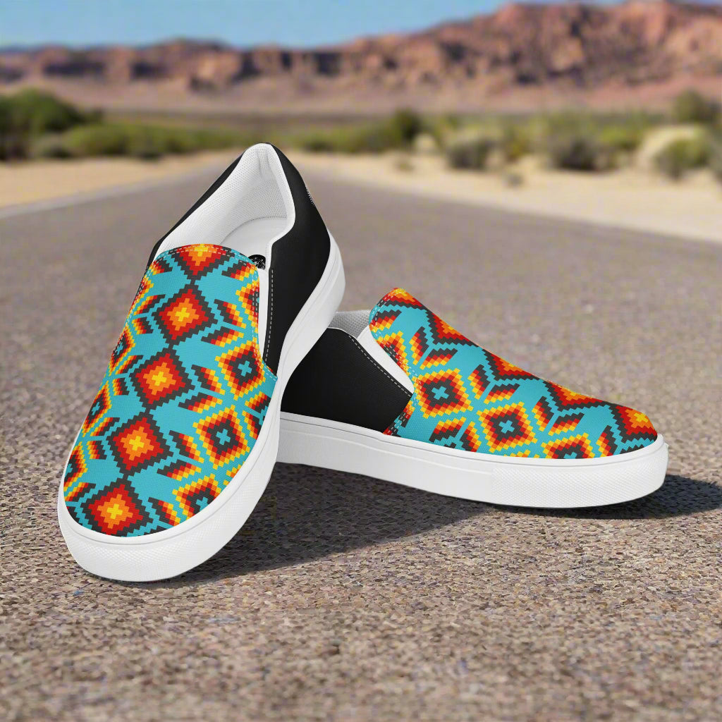 WildSage Market Slip-on Canvas Shoes Huichol Halftone with colorful geometric patterns on a scenic background