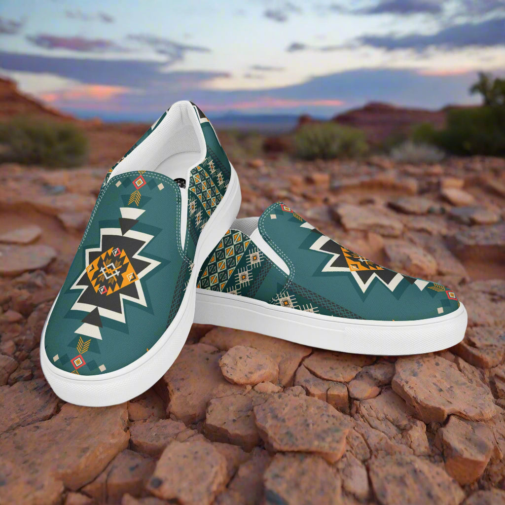 Slip-on Canvas Shoes Kiva Southwest Print featuring a vibrant geometric design on a rocky background
