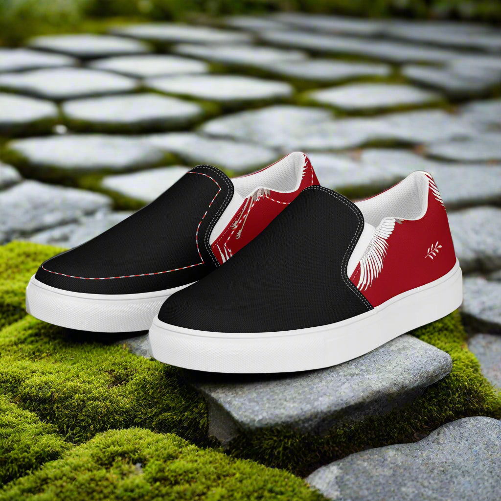 Slip-on Canvas Shoes Red Crane Two Tone featuring stylish black and red design on a stone pathway