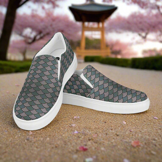 WildSage Market Slip-on Canvas Shoes Sea Foam featuring a stylish wave pattern in a serene garden setting