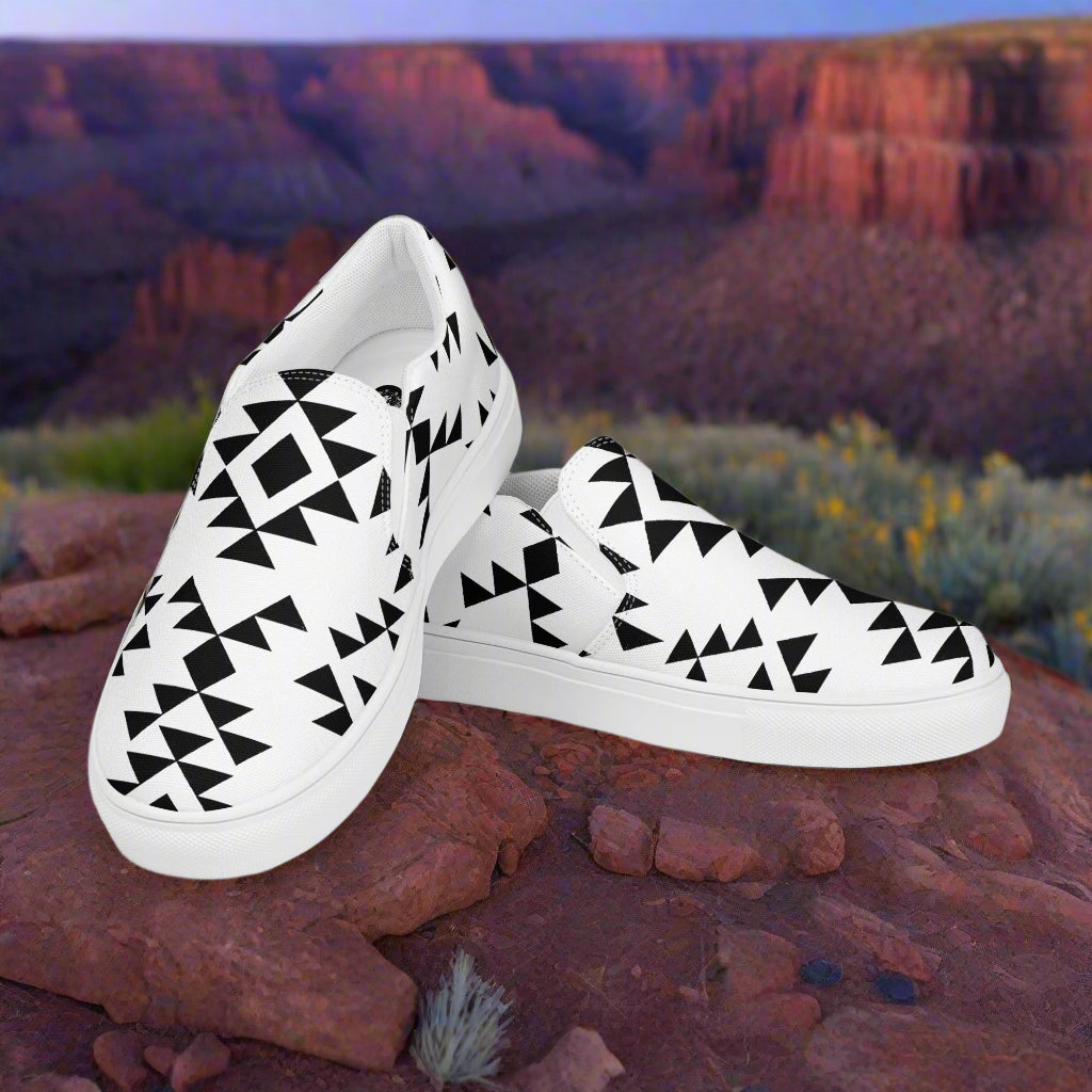 Southwest slip-on canvas shoes Sonora featuring a bold black and white geometric pattern on a natural backdrop