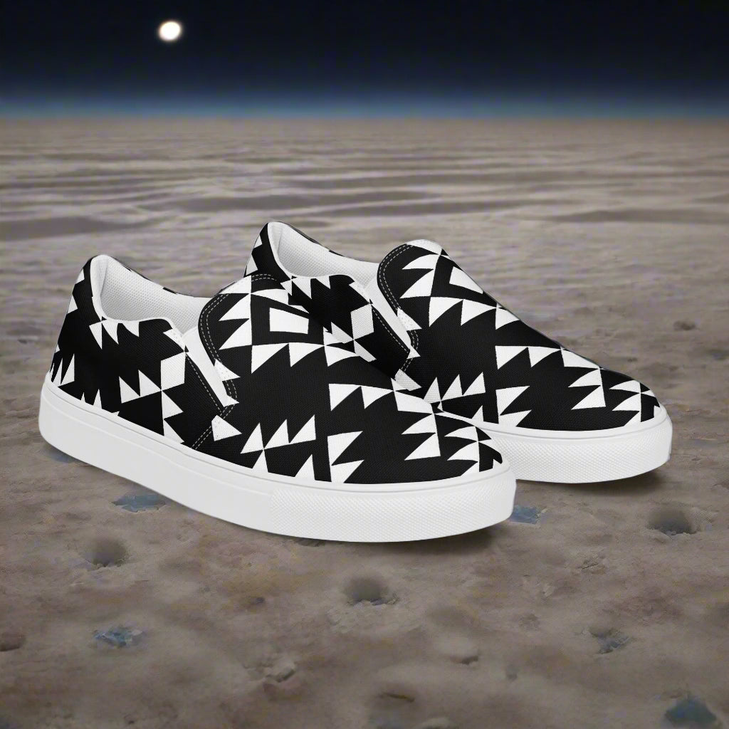 Southwest styled womens slip-on canvas shoes featuring a black and white geometric pattern
