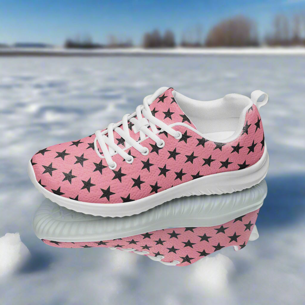 WildSage Market womens pink star print sneaker Custom Athletic Shoes with white sole and laces on icy surface