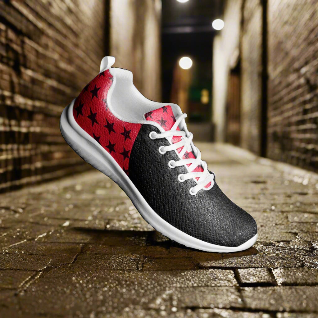 WildSage Market Womens Athletic Shoes black sneaker with red star heel white sole and laces on wet cobblestone alley
