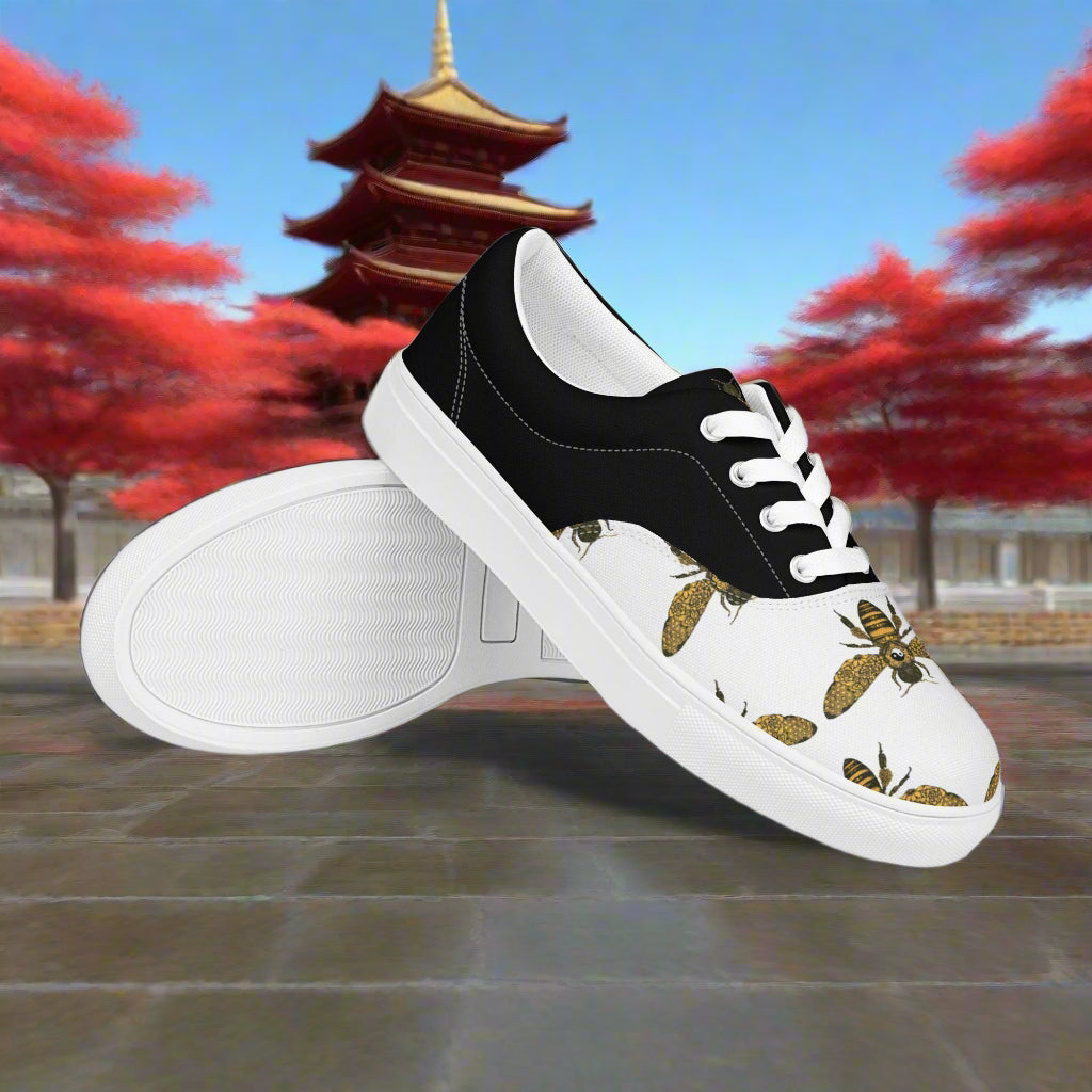 WildSage Market lace-up canvas shoes with bee print half tone design on a white and black background
