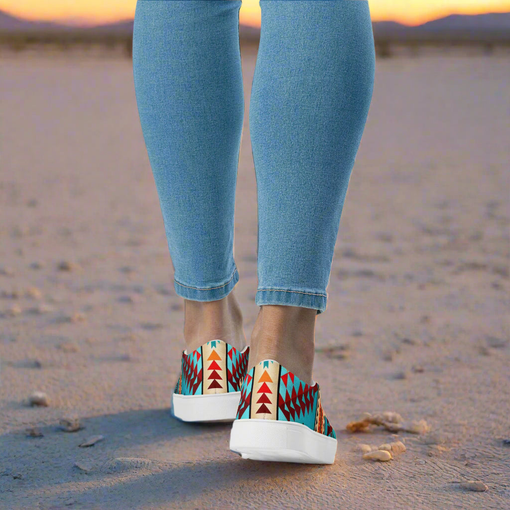 WildSage Market Southwest print slip on shoes Taos with colorful geometric design worn with jeans