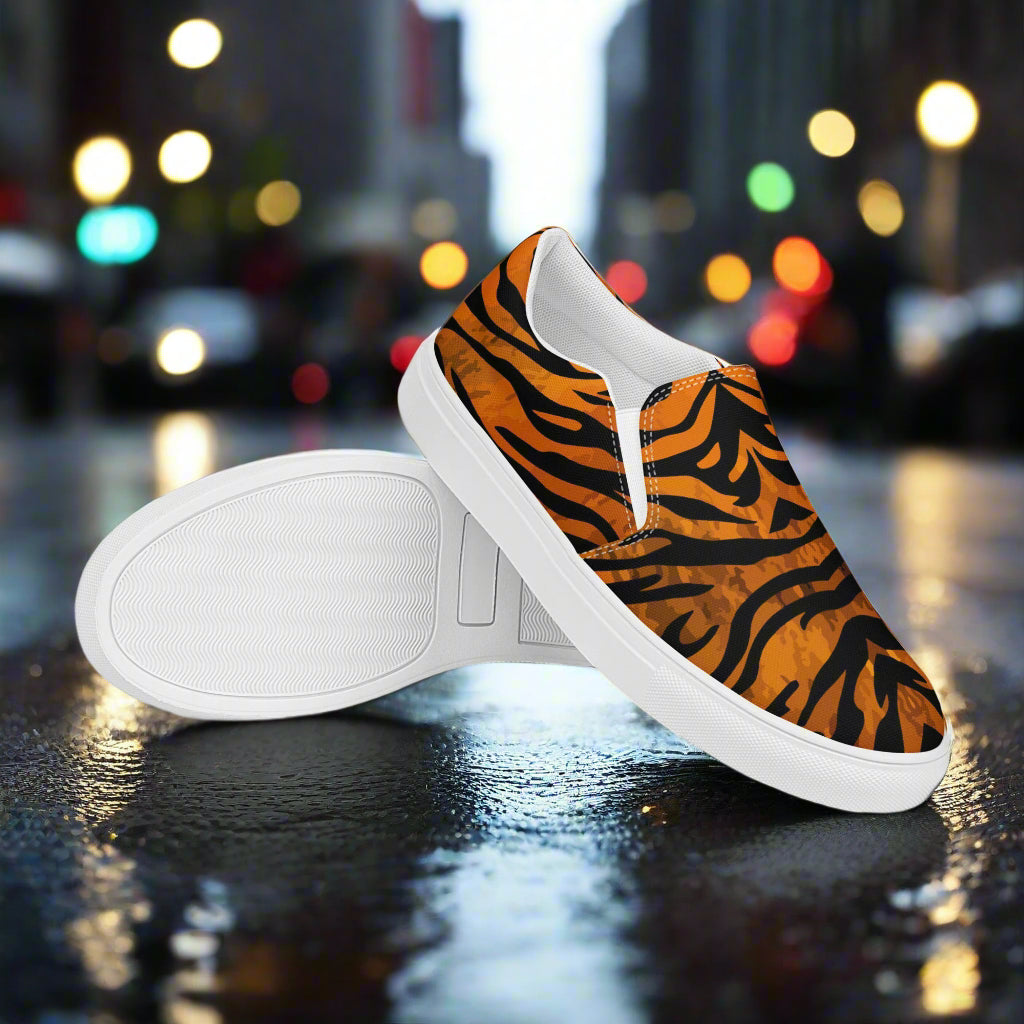 WildSage Market tiger print slip on shoes with bold orange and black stripes and white soles