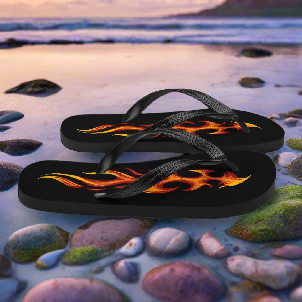 WildSage Market tribal flame flip-flops featuring vibrant flame design on a black background