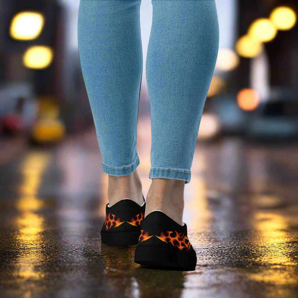 Tribal flame slip on canvas shoes with vibrant flame design, perfect for casual outings