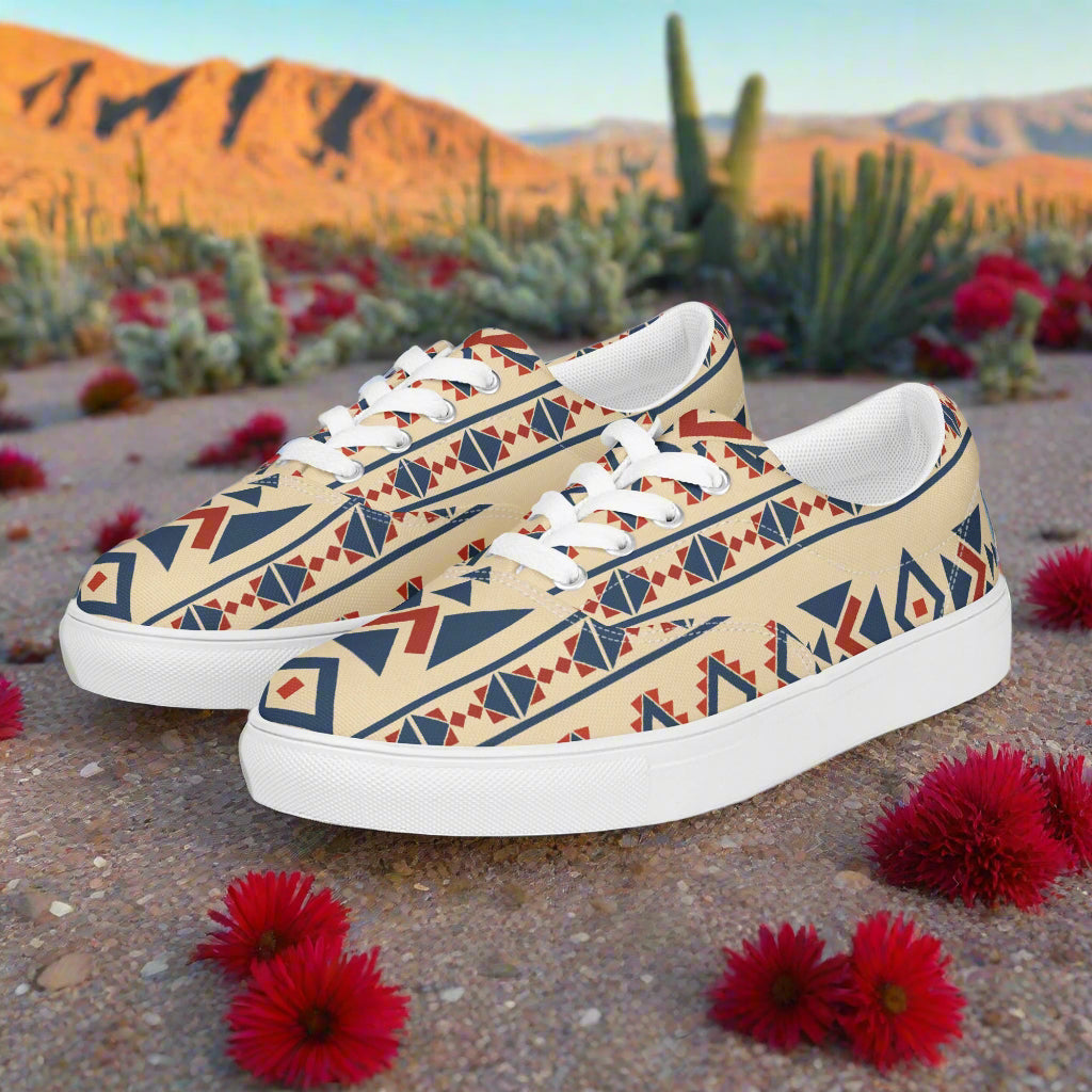 Custom Lace-up Canvas Shoes with tan geometric tribal print navy and rust accents white soles on desert background